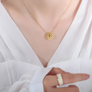 Chinese style gold plated titanium steel necklace with hollow Fu character round pendant