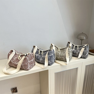 Striped canvas Boston tote bags in four colors with wide straps and minimalist design