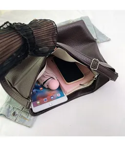 Detailed top view of large capacity dark brown tote bag showing spacious interior compartment