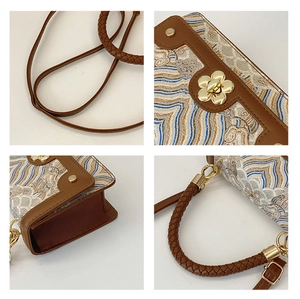 Detailed views of floral metal clasp and embroidered wavy pattern on the crossbody bag