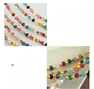 Macro shot of colorful faceted tourmaline stones and 18k gold plated beads on the necklace