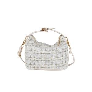 White and gold tweed plaid shoulder bag with metallic handle and golden hardware on white background