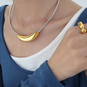 Two-tone snake chain necklace with banana pendant and thick gold ring set for women
