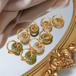 Double layered 18k gold plated stainless steel hoop earrings with crystal pavé pendants