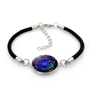 Detail of hand-woven Pisces constellation bracelet with blue neon glass pendant and silver clasp