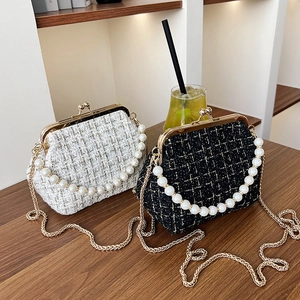 Elegant tweed crossbody bags in black and white with pearl handle and metal chain