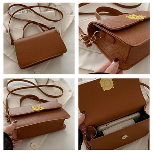 Detailed views of brown pebble leather handbag with gold dragon buckle and strap