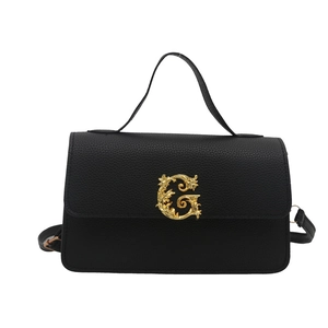 Chic black litchi pattern crossbody bag with gold baroque G buckle and top handle