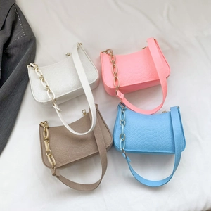 Chic croc-embossed underarm bags in white, pink, brown and blue with chain straps