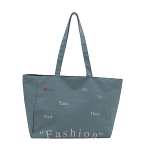 Blue denim tote bag with weekly letter print for casual shoulder or hand carry