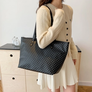 Large black patterned tote bag for women, stylish commuter shoulder bag in high-quality fabric