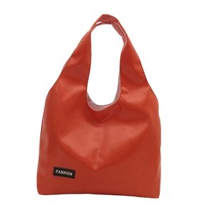 Orange red oil wax leather tote bag with minimalist design and Fashion label icon