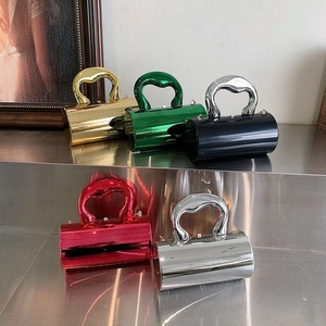 Chic acrylic cylindrical handbags with wavy handles in metallic gold, red, and emerald