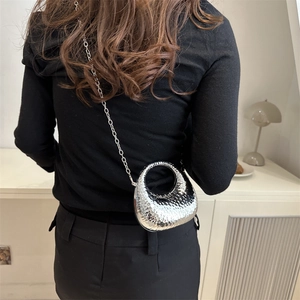 Silver hammered texture mini metal crossbody bag with chain strap and round top handle