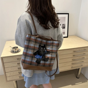 Plaid canvas tote bag with embroidered cat patch and brown leather handles for women