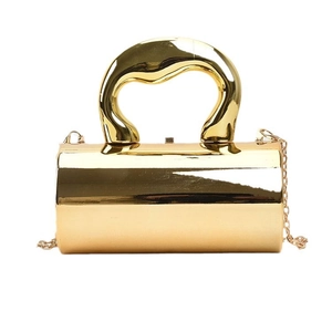 Chic gold cylindrical acrylic handbag with artistic wavy handle and metal chain strap