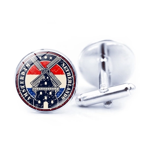 Detailed macro view of Amsterdam cufflinks featuring iconic windmills and Dutch flag colors