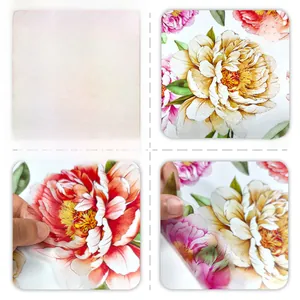 Close-up of waterproof floral wall decals with vibrant peonies and green leaves