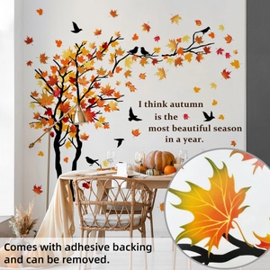 Detail of colorful autumn maple tree wall decal with leaves and birds in a cozy room