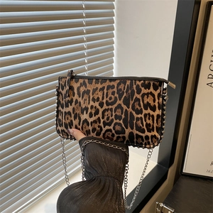 Leopard print crossbody bag with silver chain strap and metal rivet edges for women
