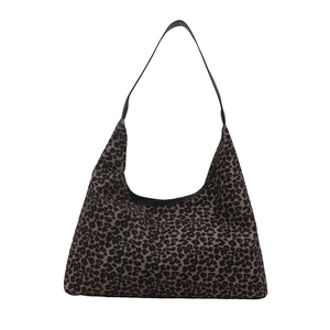 Grand sac cabas en toile imprimé léopard avec bandoulières en cuir noir sur blanc