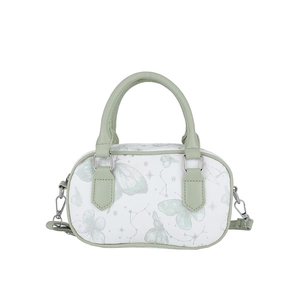 White Boston handbag with light green butterfly and star prints, featuring green top handles