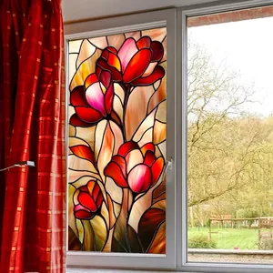 Stained glass window film with red tulips providing privacy and natural light for home decor
