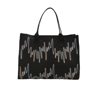 Grand sac cabas noir avec broderie vagues colorées et texture gaufrée élégante