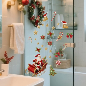 Detailed Santa Claus sleigh and Christmas tree static cling stickers on a glass shower door