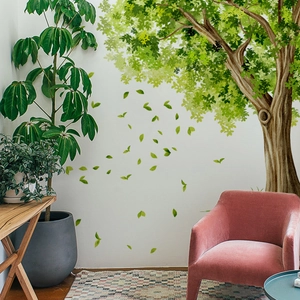 Lush green tree wall sticker with falling leaves for kids' bedroom and living room decor