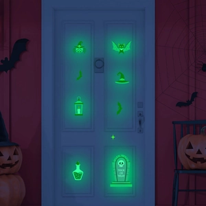 Luminous green Halloween wall stickers featuring ghosts, tombstones and spooky elements