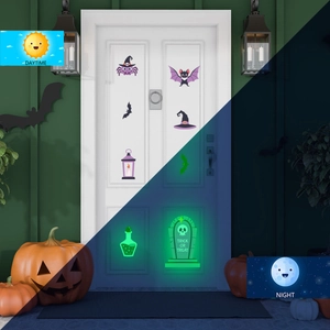 Luminous Halloween wall stickers set with ghosts and bats in day and night contrast