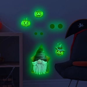 Luminous Halloween gnome wall stickers with glowing pumpkins and eerie eyes in dark room