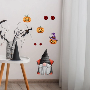 Detail of Halloween gnome and pumpkin wall stickers in a cozy home interior setting