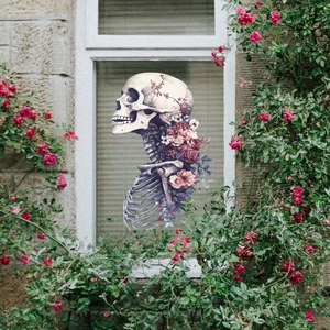 Gothic floral skull window sticker with red roses and green leaves on glass background