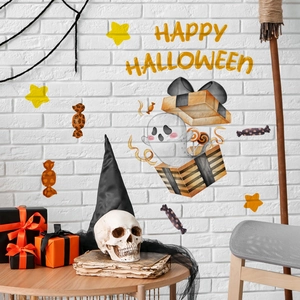 Detail of Happy Halloween wall stickers with cute ghosts and orange candy decals