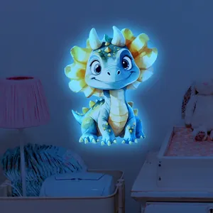 Luminous blue and yellow cartoon dinosaur wall sticker glowing in a cozy nursery room