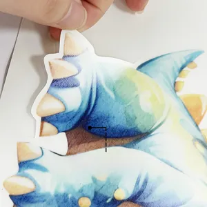 Close-up of luminous watercolor dinosaur wall sticker showing glowing feature and texture