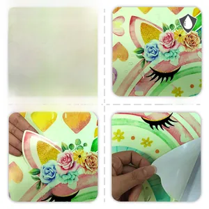 Detailed view of waterproof unicorn wall decals with rainbow and floral heart patterns