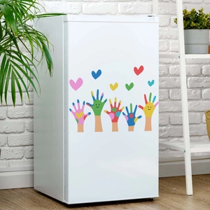 Colorful cartoon hand and heart shaped self-adhesive stickers on a white fridge door