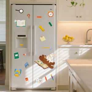 Cartoon bear and school supplies wall stickers applied on white refrigerator door