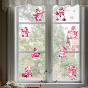 Pink snowman and snowflake static window clings for festive glass wall decoration