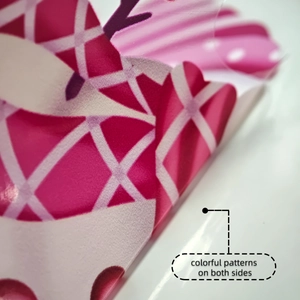 Detail of double-sided colorful geometric snowflake pattern on static window sticker
