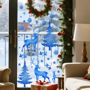 Blue Christmas window silhouettes featuring reindeer and trees on glass for festive decor