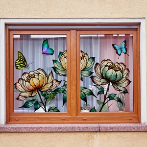 Detail of stained glass style floral window stickers with colorful butterflies and flowers