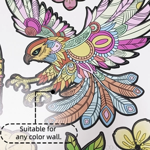 Detail of colorful geometric eagle wall sticker with floral accents on a transparent base