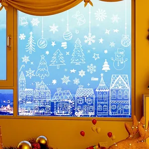 White Christmas window decals featuring snowy houses, trees, and stars for holiday glass decor