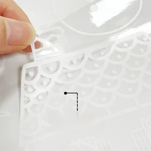 Detail of double-sided colored white house roof sticker with static cling for windows
