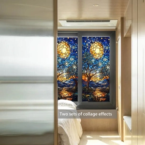 Detail of artistic mosaic window film with starry sky and trees in a bright bedroom