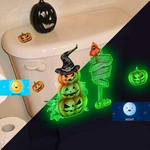 Luminous Halloween pumpkin stickers set showing daytime and green glow night effect